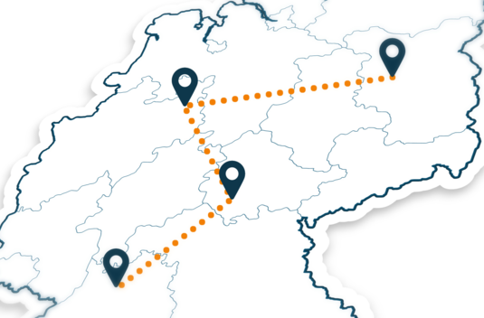 Karte von Deutschland mit vier Standortmarkern und orange gepunkteter Route
