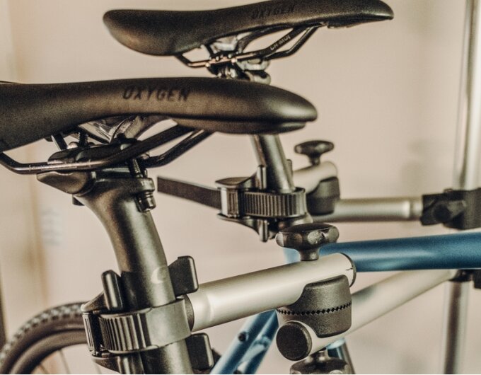 Bicycle saddles and frames secured in the indoor bike rack of a Carado motorhome