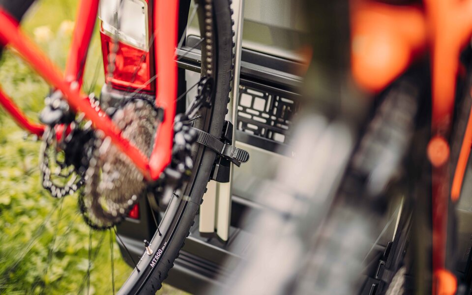 Close-up of bicycles on a rear-mounted rack on a Carado motorhome