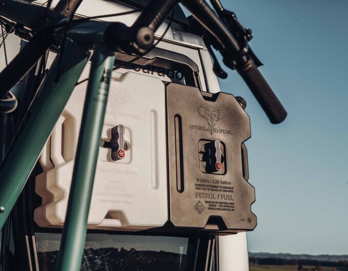 Rear carrier on Carado motorhome with bicycles as well as water and fuel canisters