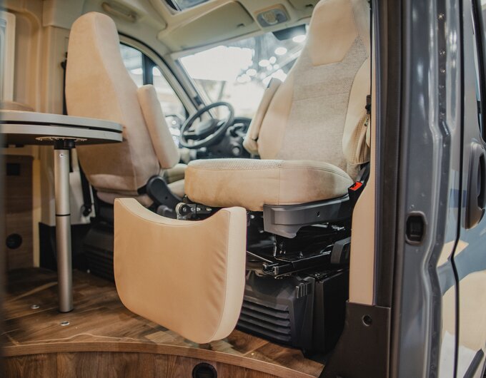 Carado motorhome interior with swivel captain’s seats and table