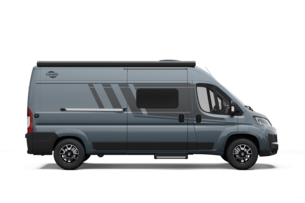 Side view of a grey Carado camper van with sliding door, side window and awning