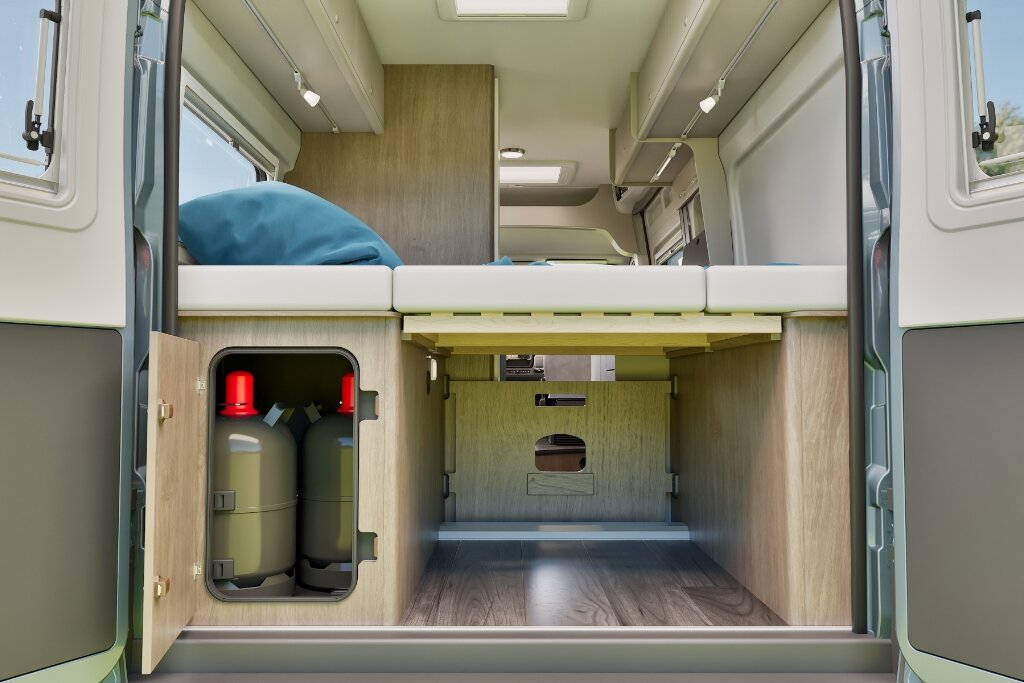 Rear view of the Carado motorhome with drop-down bed, storage space and gas cylinder compartment