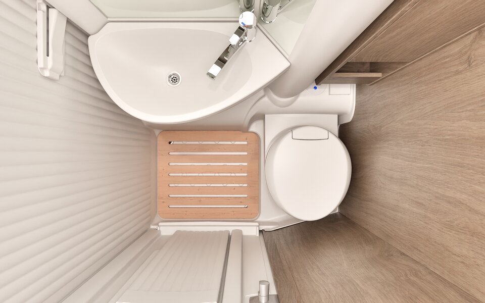 Carado motorhome bathroom with washbasin, toilet and shower area