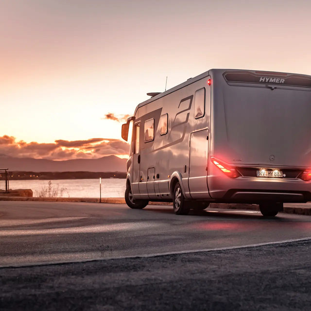 HYMER B-Class MasterLine I cornering on the Scandinavian coast in the sunset